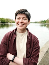 Image of a white person next to the river