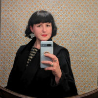 Selfie of a white woman with dark hair