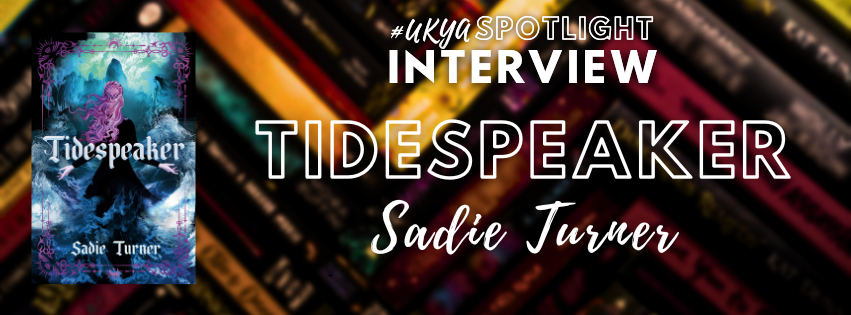 Title in white on blurred black, red, and gold book spines next to image o blue book cover