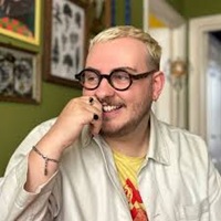 Headshot of a white man indoors