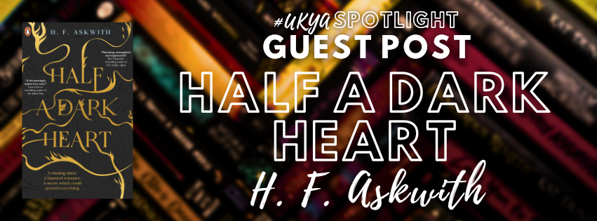 Title in white on black, red, and gold book spines next to image of black book cover