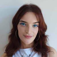 Image of white woman before a white wall