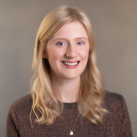 Headshot of a white woman with long blonde hair